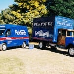 The old and new Pickfords trucks standing next to each other.